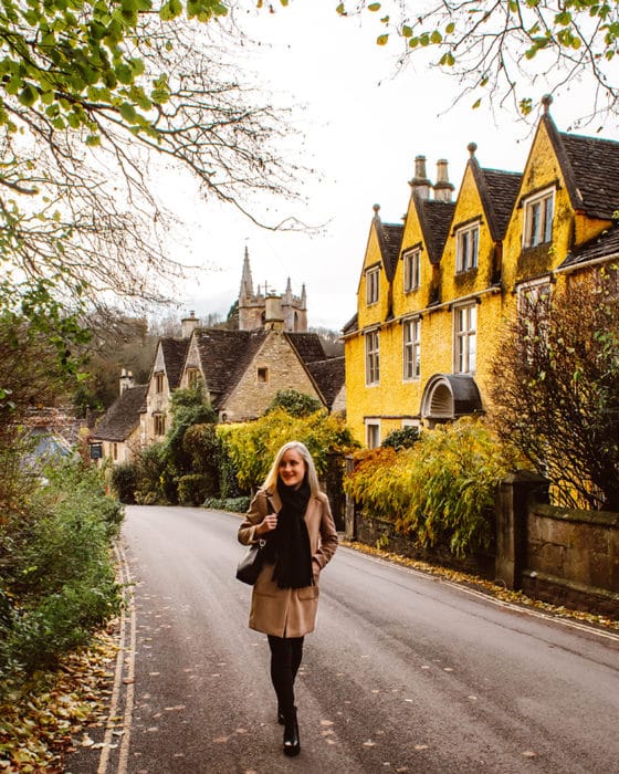 Strolling through the pretty streets of Castle Combe, UK