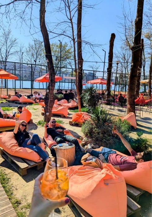 Enjoy a happy hour cocktail in the Grand Park of Tirana