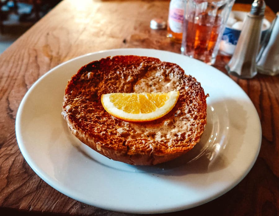 Trying the famous Bath Buns at Sally Lunn's tea shop