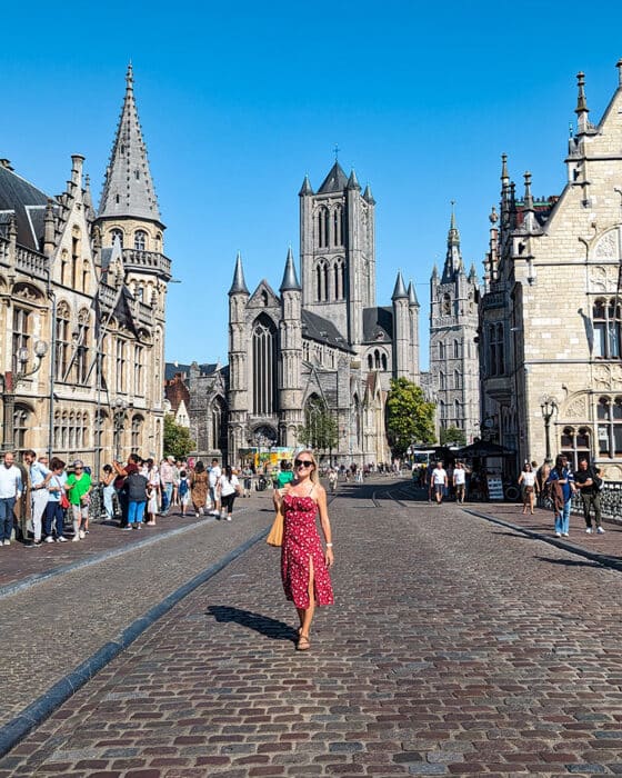 A girl walks across St. Michael's Bridge in Ghent