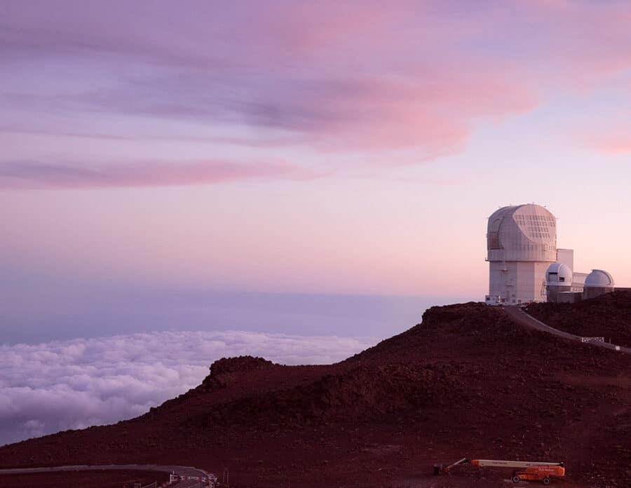 Haleakala Observatory with sunset clouds in the background
