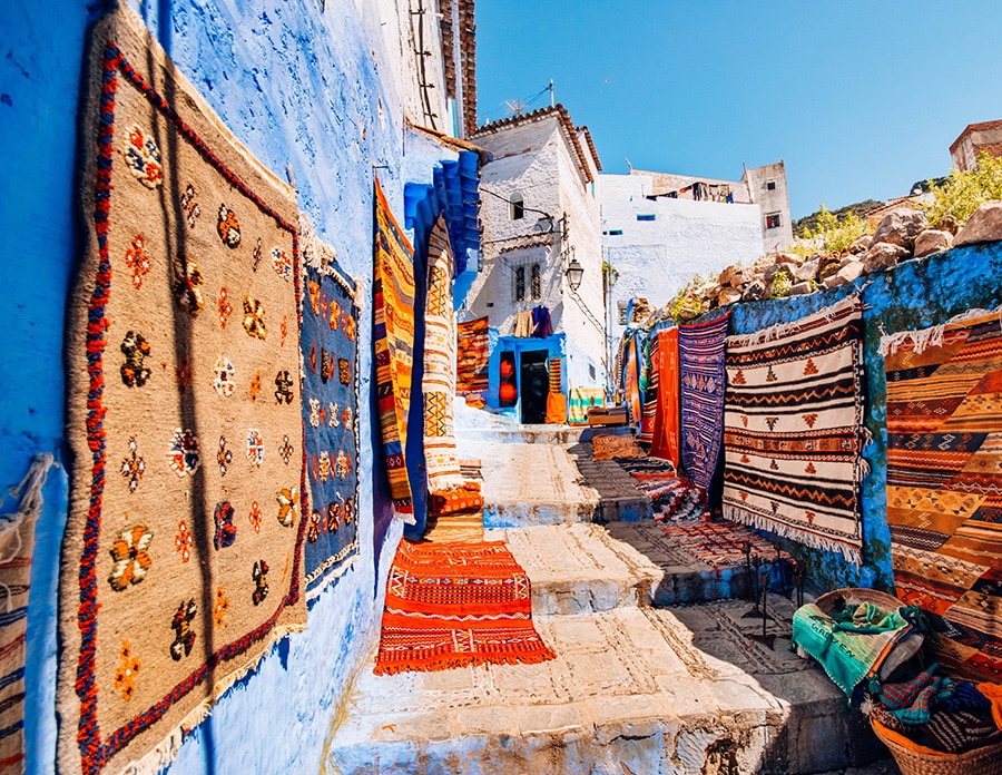 Colourful carpets on display around the streets of Chefchaouen